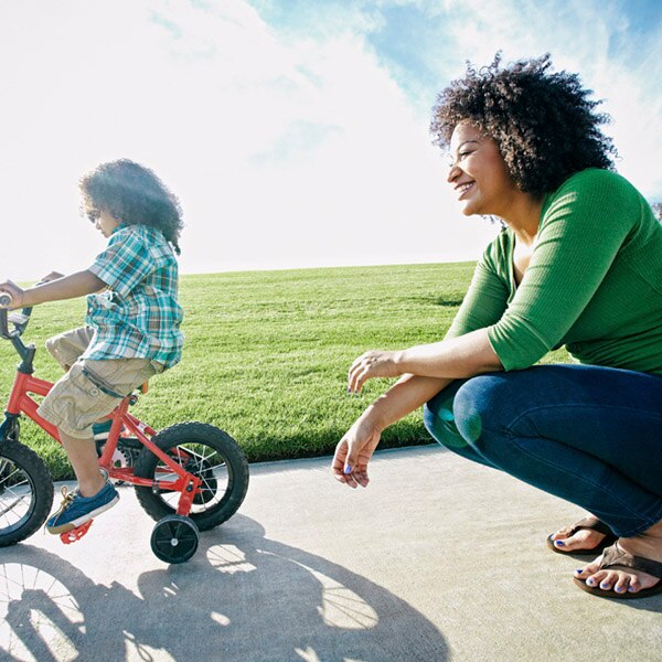 mother with child riding a bike