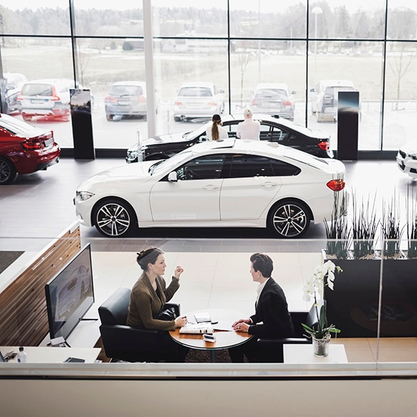 White car in dealer showroom