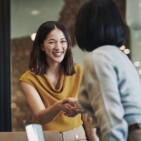 Women shaking hands