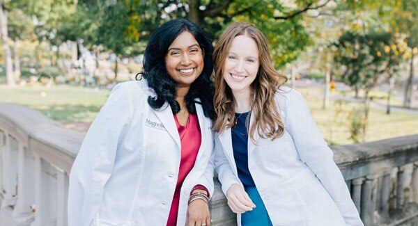 Two female dermatologists